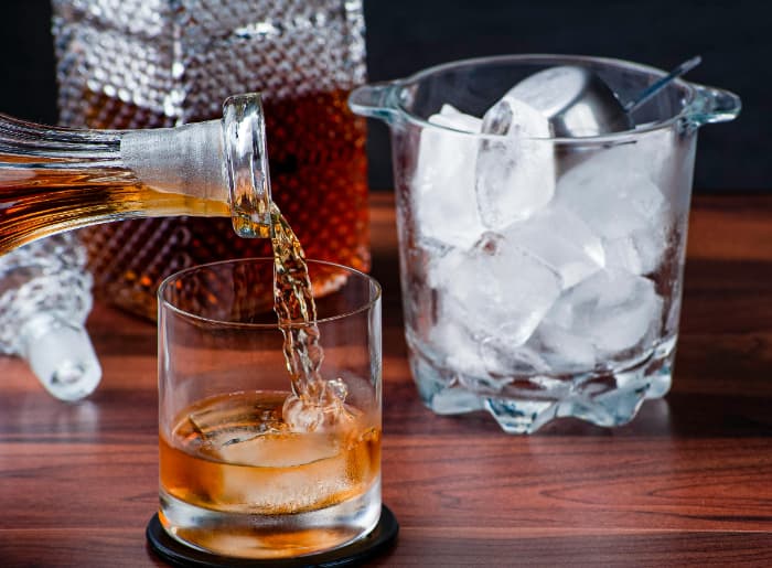 Scotch whisky being poured into a glass