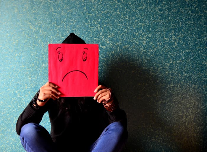 A person experiencing sadness