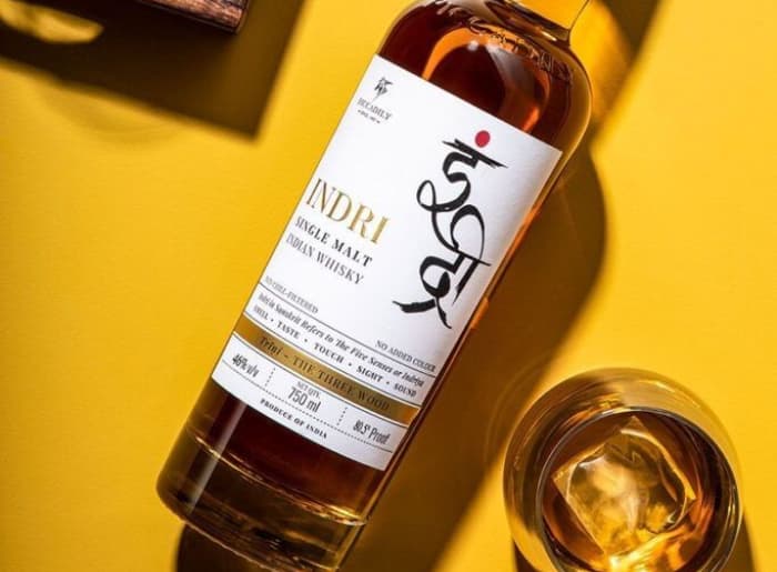 Indri vs Amrut Indian single malt whisky bottles compared by flavor, maturation, and alcohol percentage