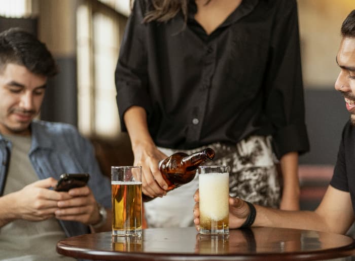 Beer being poured in a glass
