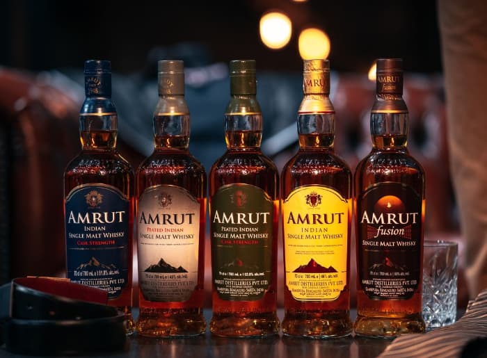 Indri vs Amrut Indian single malt whisky bottles compared by flavor, maturation, and alcohol percentage
