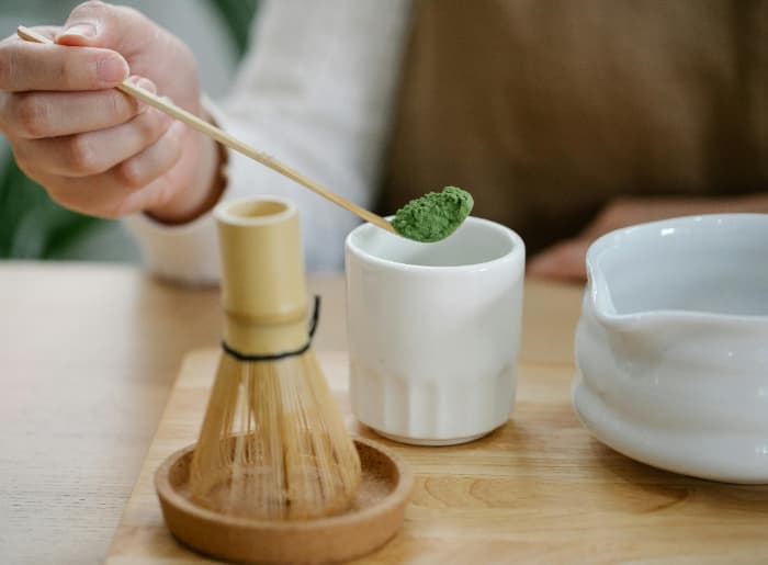 Person making matcha