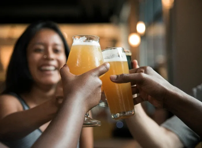People enjoying pilsner-style beer.webp