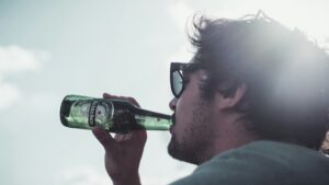 picture of a man drinking for the unsobered listilce - 5 Strange Reasons You're Getting Drunk Faster