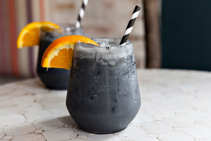 Image for unsobered listicle on charcoal cocktails