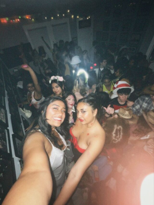 College girls taking a selfie in a nightclub