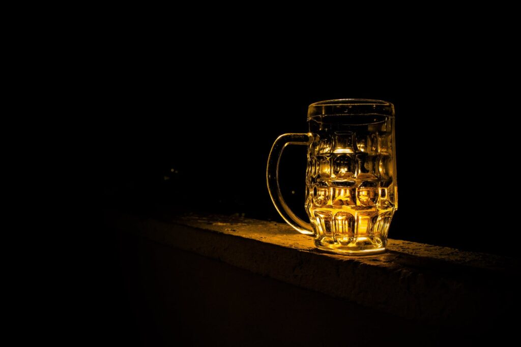 A fine glass of beer in the dark
