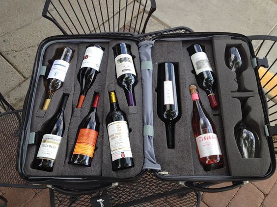 alcohol bottles packed in a suitcase