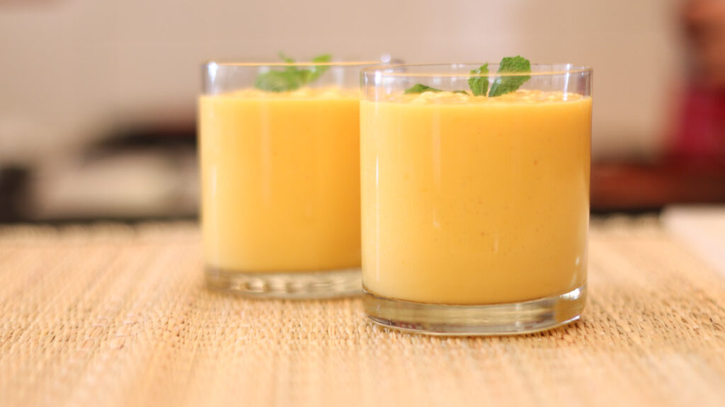 A cocktail made out of mango lassi