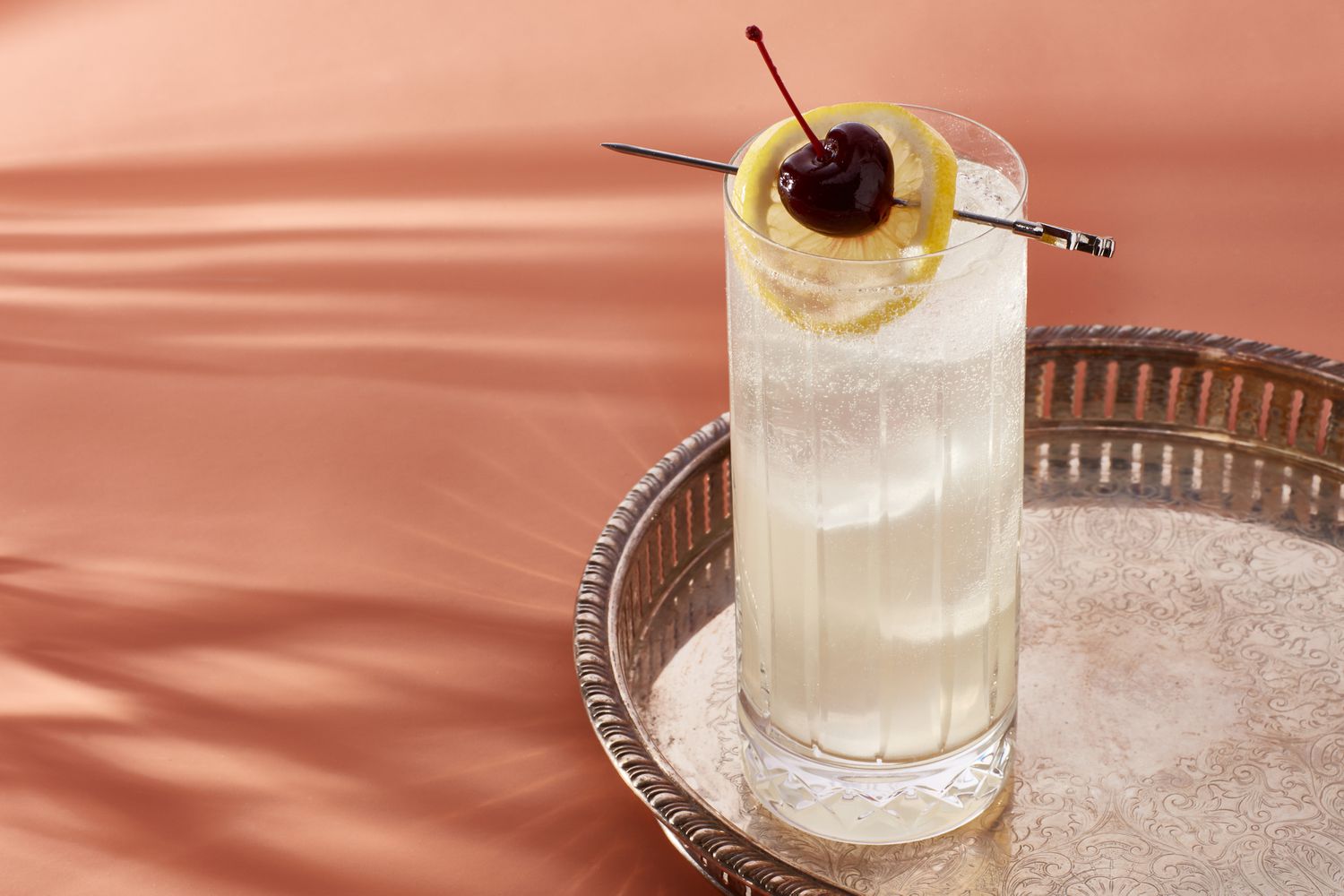 Tom Collins is a cocktail that uses gin as its liquor base, with lemon juice, simple syrup, and club soda