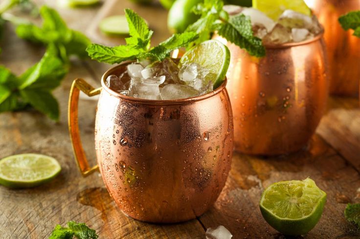 Two mugs of Moscow Mule, that are a great drink for a first-time drinker
