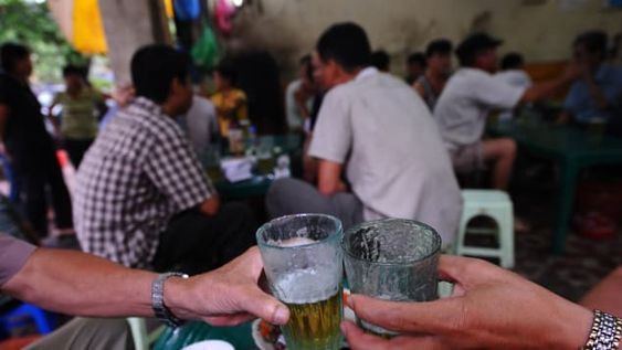 The world's cheapest beer, Bia Hoi, served in the traditional Cauldron Glass.
