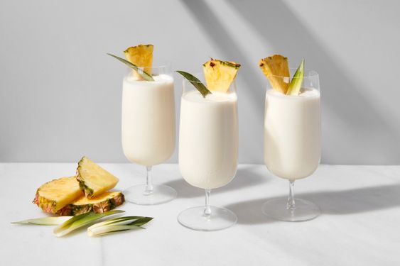 Glasses of Piña Colada, a popular pineapple flavored cocktail.