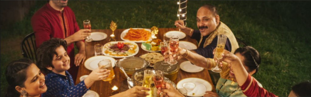 A happy family that know how to raise a good toast.