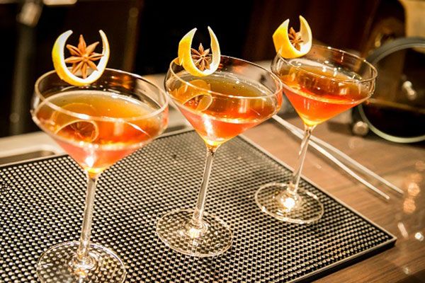 An image of garnished cocktail glasses.