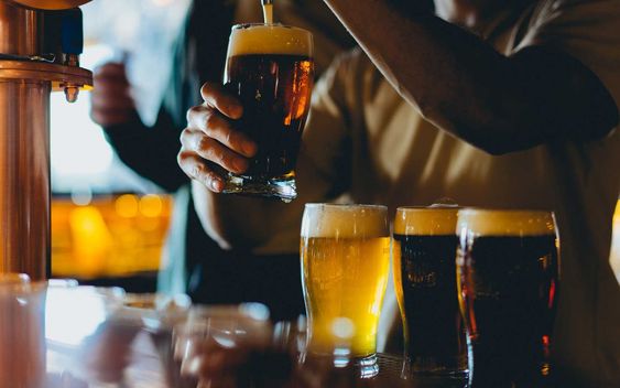 Ales and bitters, the most popular drinks of the British pub culture.