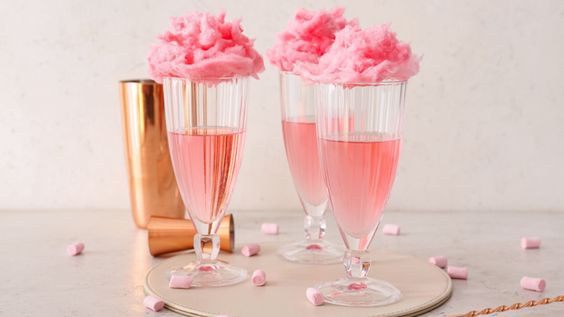 Champagne can be used to make cotton candy cocktails that are both pretty and fun.