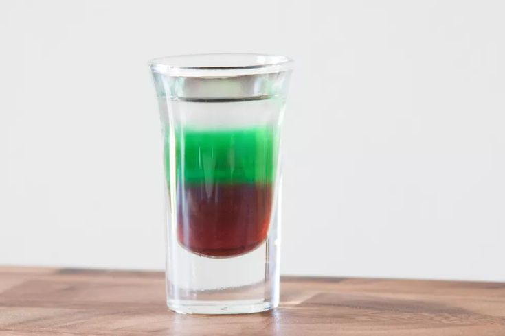 A layered vodka jello shot cocktail brings multiple flavors and colors to a single cocktail.